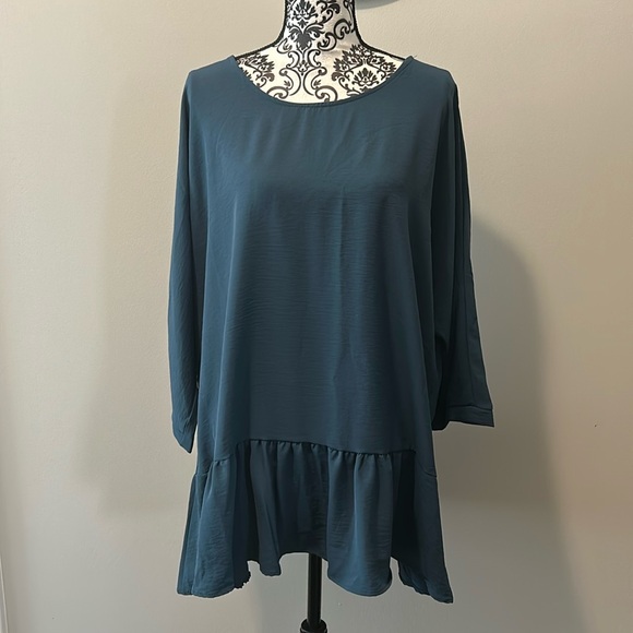 NWOT. Woman’s round neckline blouse with 3/4 length sleeves & ruffle hemline. - Picture 2 of 10